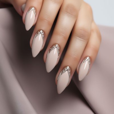 woman-s-nails-with-silver-design-that-says-i-love-you
